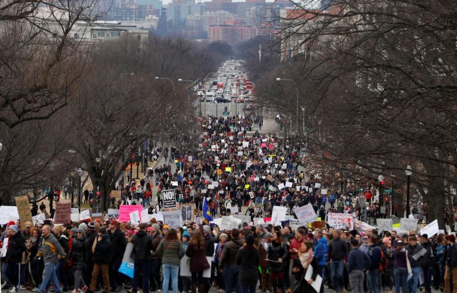Activists march to the US Capitol to protest President Donald Trump's executive actions on immigration in Washington. #NoMuslimBan,No Muslim Ban,NoMuslimBan,Trump's travel ban,Donald Trump,Protests erupt over Donald Trump,Muslim,Muslim ban