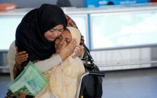A woman greets her mother after she arrived from Dubai on Emirates Flight 203 at John F. Kennedy International Airport in Queens, New York, January 28, 2017.