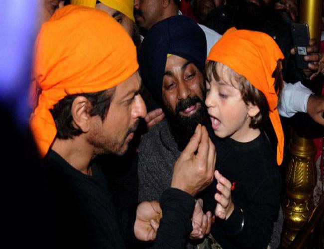 The actor and producer were on a promotional trip in Amritsar and took time out to visit Darbar Sahib. Shah Rukh even tweeted an image with AbRam. They were both dressed in black and covered their head using an orange cloth. AbRam,Shah Rukh Khan,Shah Rukh Khan visits Golden Temple,SRK visits Golden Temple,SRK visits Golden Temple with son AbRam,SRK with son AbRam,SRK with AbRam,Shah Rukh Khan with AbRam,SRK,Raees Sucess