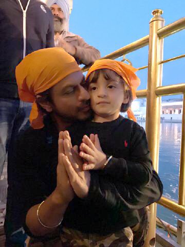 Of his experience, Shah Rukh said: "The peace and serenity one derives at Darbar Sahib is something I feel you can attain nowhere in this world. "I would firstly like to express my gratitude to Darbar Sahib for the reception of our film." The visit also proved to be a first time experience for AbRam and Excel Entertainment's Sidhwani. Before entering the Golden Temple, Shah Rukh said: "It is the first time that Ritesh and my little son AbRam will be visiting the Golden Temple. It was my wife who sent AbRam along with me to seek blessings. I am very happy to be here." AbRam,Shah Rukh Khan,Shah Rukh Khan visits Golden Temple,SRK visits Golden Temple,SRK visits Golden Temple with son AbRam,SRK with son AbRam,SRK with AbRam,Shah Rukh Khan with AbRam,SRK,Raees Sucess