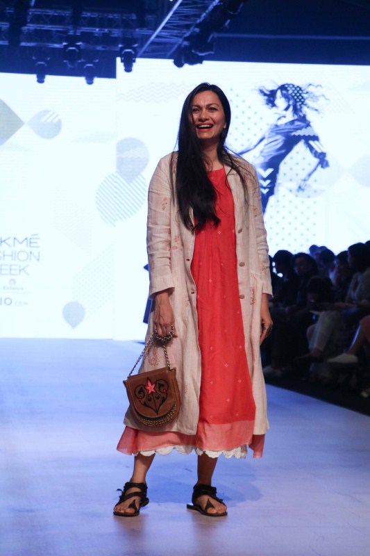 A model displays the creation of fashion during the Lakme Fashion Week Summer/Resort 2017, in Mumbai on February 1, 2017. Kiran Rao,Kiran Rao at Lakme Fashion week,Lakme Fashion week,Lakme Fashion week day 1,Lakme Fashion week pics,Lakme Fashion week images,Lakme Fashion week photos,Lakme Fashion week stills,Lakme Fashion week pictures