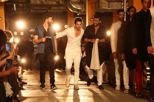 Bollywood actor Arjun Kapoor and Varun Dhawan walks ramp for Kunal Rawal at Lakme Fashion Week 2017.