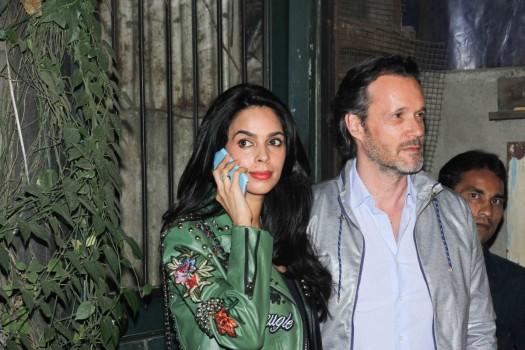 Bollywood actress Mallika Sherawat along with her boyfriend spotted at Bandra Pali Village in Mumbai.