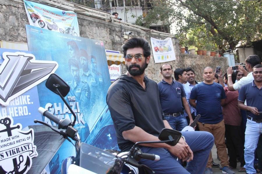 The actor got a handover of the bike keys and also completed the formalities of owning the bike. Rana had become a proud owner of the bike, he then was seen happily posing with his newly owned piece. Rana Daggubati,actor Rana Daggubati,Baja V bike,Baja V,The Ghazi Attack,The Ghazi Attack promotion,The Ghazi Attack movie promotion,The Ghazi Attack promotion pics,The Ghazi Attack promotion images,The Ghazi Attack promotion photos,The Ghazi Attack promot