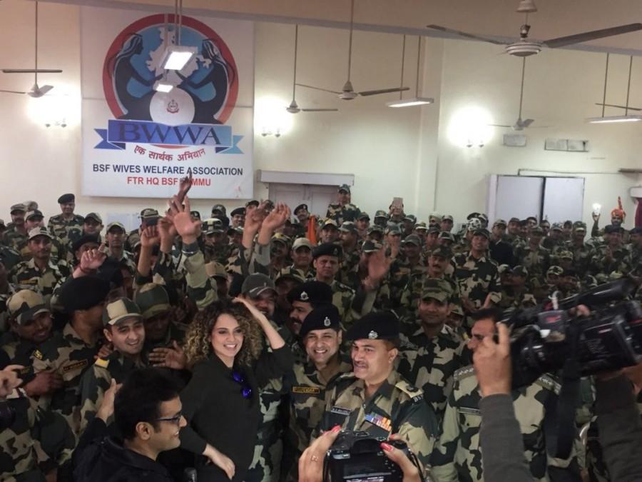 The actress arrived in Jammu at 9:30 in the morning and was received by the BSF Jawans. She was warmly welcomed and musically greeted with the BSF band, along with BSF officials and their families who she interacted with. Kangana then headed for a BSF base camp tour in their gypsy where she halted at the BSF school and happily interacted with the school children, who were very excited to see her. Kangana Ranaut,actress Kangana Ranaut,BSF Jawans,Jawans,Kangana Ranaut with BSF Jawans,Kangana Ranaut with Jawans,Kangana Ranaut latest pics,Kangana Ranaut latest images,Kangana Ranaut latest photos,Kangana Ranaut latest stills,Kangana Ranaut latest pictu