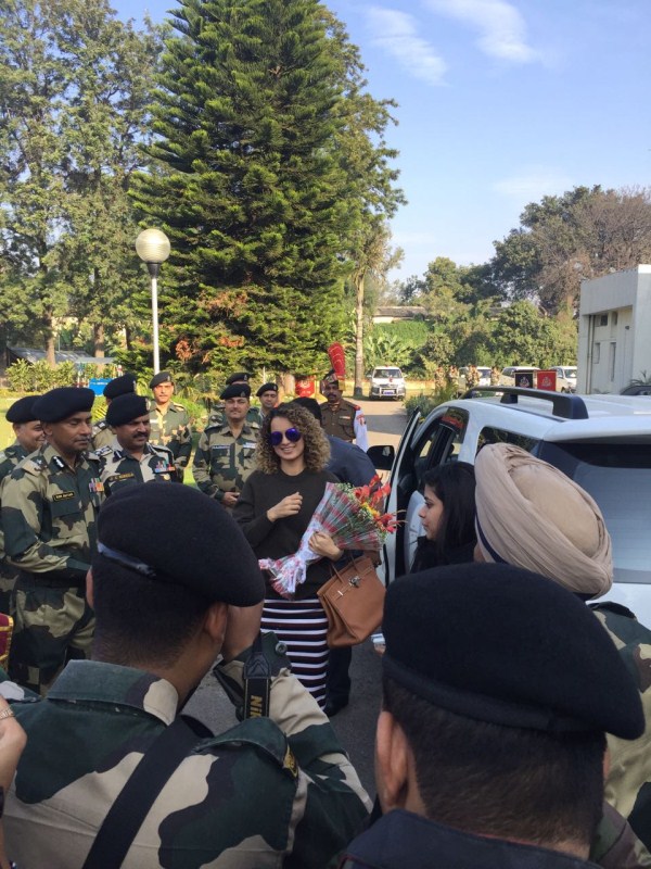 It was already time for lunch so she headed to the officers institute where she had a formal lunch with the BSF jawans along with their spouses. It was rather heartening to see her eating with them at their mess where they all had a nice, light-hearted interaction. Once the lunch was over, Kangana posed for a final round of pictures with the armed forces and was then dropped back by the BSF Jawans to the airport. Kangana Ranaut,actress Kangana Ranaut,BSF Jawans,Jawans,Kangana Ranaut with BSF Jawans,Kangana Ranaut with Jawans,Kangana Ranaut latest pics,Kangana Ranaut latest images,Kangana Ranaut latest photos,Kangana Ranaut latest stills,Kangana Ranaut latest pictu
