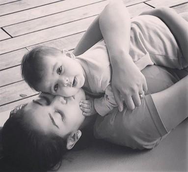 Bollywood actor Shahid Kapoor has finally shared a photograph of his five-month-old daughter Misha Kapoor on social media. Shahid on Wednesday shared a black-and-white photograph of his daughter along with his wife Mira Rajput, on Instagram. In the image, Mira is seen hugging the baby and kissing her cheek, while Misha is looking towards the camera. 