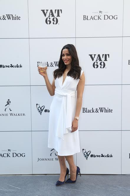 "It's my dad's favourite and when I say that people think it's mostly what old men drink, but no," said the actress while expressing her love for Scotch. "My dad has got a great sense of humour so it's not a boring drink. I do like on the rocks, on a rare or happy occasion but my favourite cocktail is 'old fashioned'," she said. The actress said she enjoys her sister's company while drinking. Freida Pinto,actress Freida Pinto,Freida Pinto celebrates International Scotch Day,International Scotch Day,Scotch Day,Scotch Day celebrations,Freida Pinto latest pics,Freida Pinto latest images,Freida Pinto latest photos,Freida Pinto latest stills