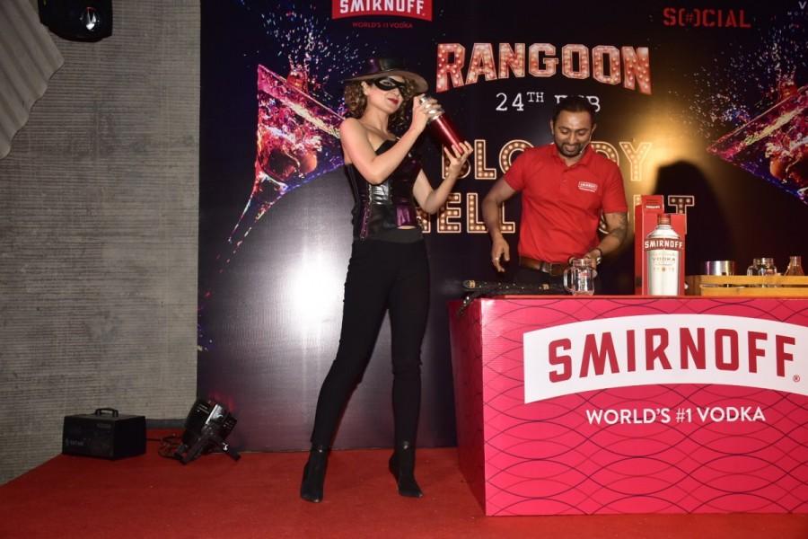 Further exhibiting her fiesty side, the actress even whipped boys at the event held to launch the cocktail inspired from the title of her upcoming film, Rangoon. Kangana was seen exploring the dark side of love and putting her kinky foot forward. Kangana Ranaut,actress Kangana Ranaut,Kangana Ranaut turns kinky,Rangoon,Rangoon promotion,Rangoon movie promotion,Jaanbaaz Julia avatar,Jaanbaaz Julia