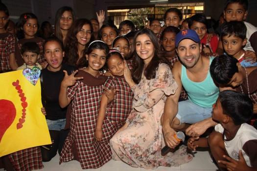 Bollywood actor Varun Dhawan and Alia Bhatt celebrate Valentine's Day with orphan child at Bandra in Mumbai.