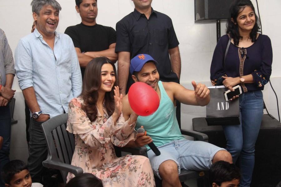 Bollywood actor Varun Dhawan and Alia Bhatt celebrate Valentine's Day with orphan child at Bandra in Mumbai. Varun Dhawan and Alia Bhatt,Varun Dhawan,Alia Bhatt,Valentine's Day,Valentine's Day celebrations,orphan child,Bandra,Mumbai