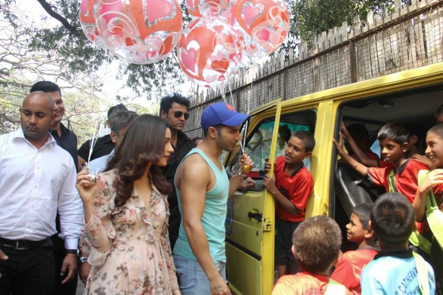 Bollywood actor Varun Dhawan and Alia Bhatt celebrate Valentine's Day with orphan child at Bandra in Mumbai. Varun Dhawan and Alia Bhatt,Varun Dhawan,Alia Bhatt,Valentine's Day,Valentine's Day celebrations,orphan child,Bandra,Mumbai