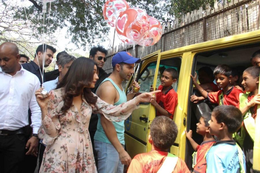 Bollywood actor Varun Dhawan and Alia Bhatt celebrate Valentine's Day with orphan child at Bandra in Mumbai. Varun Dhawan and Alia Bhatt,Varun Dhawan,Alia Bhatt,Valentine's Day,Valentine's Day celebrations,orphan child,Bandra,Mumbai
