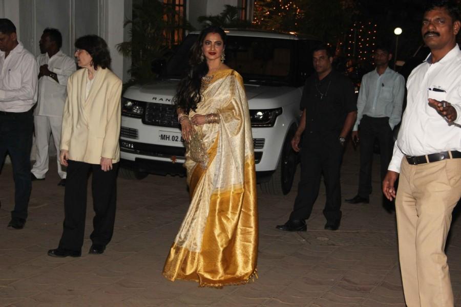 Rekha spotted at Randhir Kapoor's birthday bash. Amitabh Bachchan,Rekha,Saif Ali Khan,Kareena Kapoor,Randhir Kapoor,Randhir Kapoor birthday bash,Randhir Kapoor birthday celebrations,Randhir Kapoor birthday bash pics,Randhir Kapoor birthday bash images,Randhir Kapoor birthday bash photos,Randhir Kapoor b