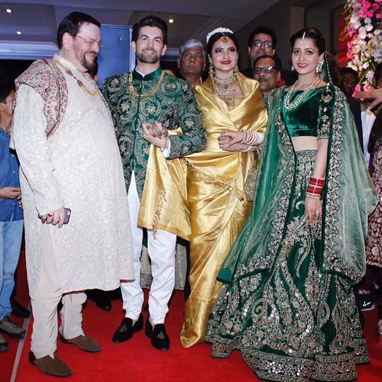 Handpicked from the "Begum-e-Jannat" collection, the ensembles are an amalgamation of sentiments that are evoked by the word 'Jannat', meaning paradise with every design in the collection being a reflection of a visual piece of paradise to be owned and cherished. Salman Khan,Amitabh Bachchan,Katrina Kaif,Rekha,Neil Nitin Mukesh and Rukmini Sahay,Neil Nitin Mukesh,Rukmini Sahay,Neil Nitin Mukesh reception,Neil Nitin Mukesh wedding reception,Neil Nitin Mukesh reception pics,Neil Nitin Mukesh reception images,Neil Ni