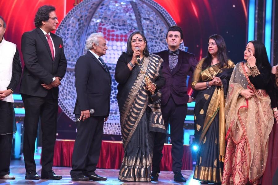 On receiving the Lifetime Achievement Award, Usha Uthup, who was dressed in a saree with mirchi motifs, said, "I am extremely honored to receive this award. I have received a lot of love from the memb Alia Bhatt,Usha Uthap,9th Royal Stag Mirchi Music Awards,Mirchi Music Awards,Royal Stag Mirchi Music Awards,Alia Bhatt,Anushka Sharma,Diljit Dosanjh,Shilpa Shetty