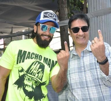 Bollywood actor Ranveer Singh casts his vote with his father at the ongoing civic body election in Bandra .