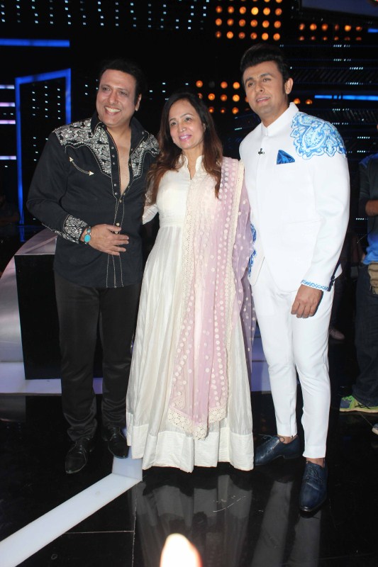 Bollywood actor Govinda, filmmaker Smita Thackeray and Singer Sonu Nigam on the sets of Sony TV's singing reality show Indian Idol season 9 to promote his film Aa Gaya Hero in Mumbai. Govinda,actor Govinda,Sunita Ahuja,Indian Idol season 9,Indian Idol,Aa Gaya Hero,Aa Gaya Hero promotion,Smita Thackeray,Singer Sonu Nigam,Sonu Nigam