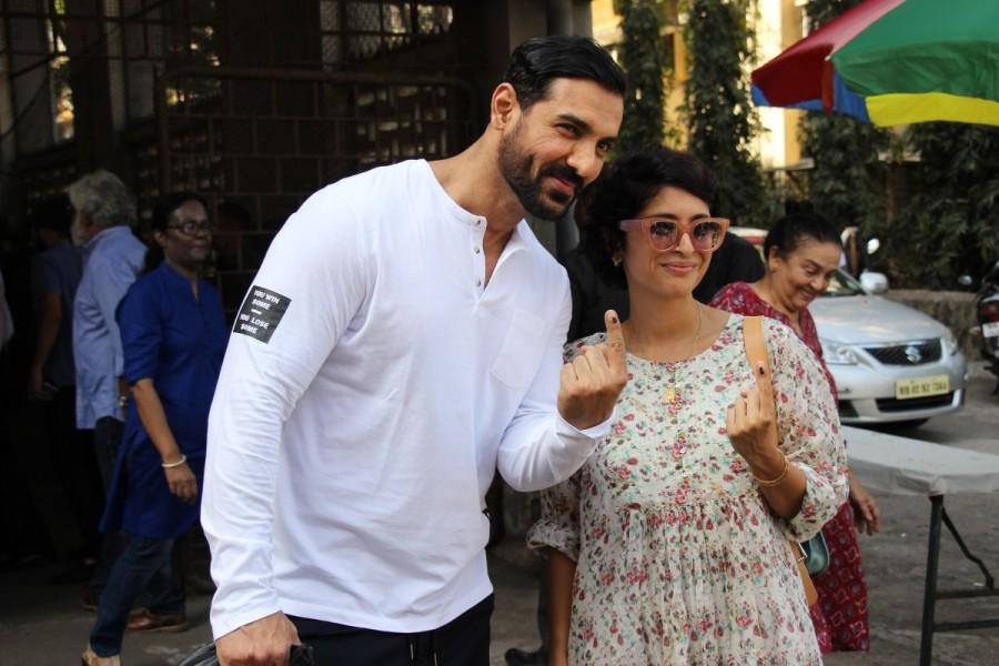 BMC Election 2017: Bollywood actor John Abraham and Aamir Khan's wife Kiran Rao cast their vote at St Anne's Church in Mumbai. John Abraham,Kiran Rao,BMC Election 2017,BMC Election,Aamir Khan,St Anne's Church