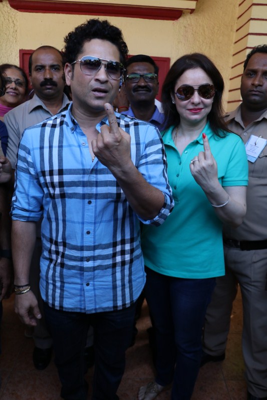 BMC Election 2017: Former Indian cricketer Sachin Ramesh Tendulkar with his wife Anjali cast their vote in Mumbai. Sachin Ramesh Tendulkar,Sachin,Sachin Tendulkar,Anjali,Anjali Tendulkar,BMC Election 2017,BMC Election,celebs at BMC Election