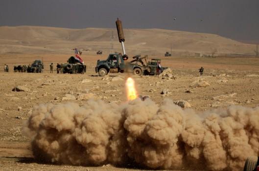 Members of the Iraqi rapid response forces fire a missile toward Islamic State militants during a battle in the south of Mosul, Iraq February 19, 2017.
