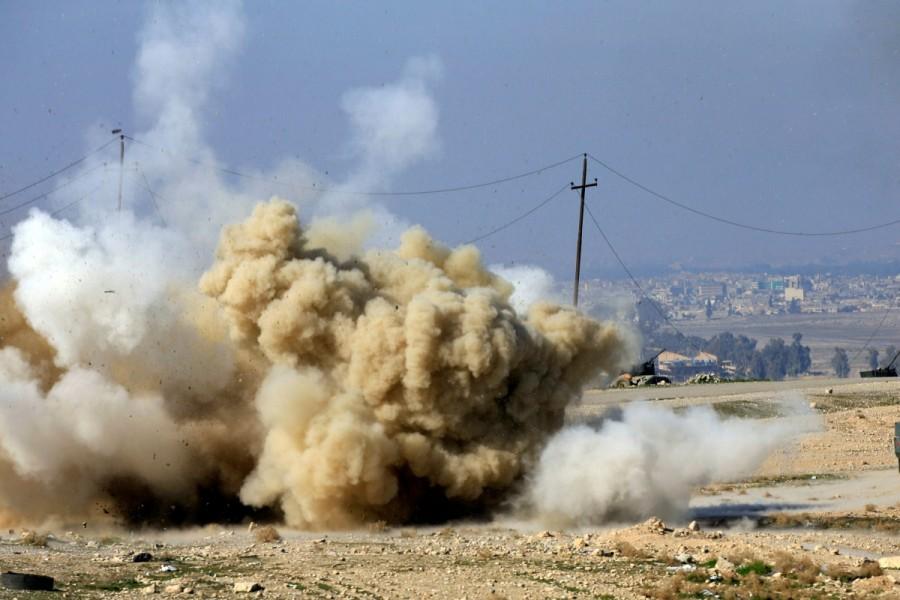 Smoke rises after an explosion of an IED planted by Islamic States fighters in south of Mosul, Iraq February 20, 2017. Iraqi forces,Mosul,Iraqi forces push into Mosul,U.S.-backed Iraqi forces