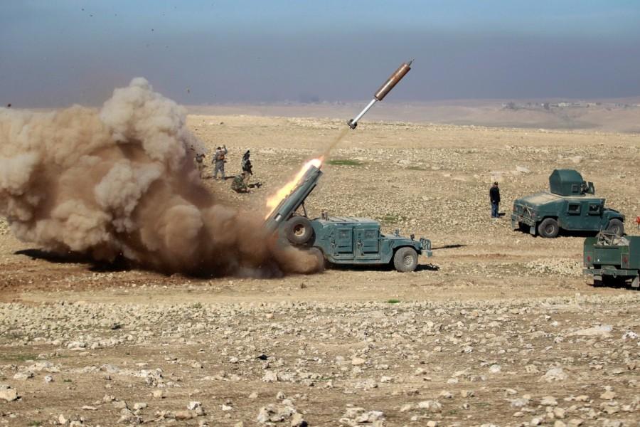 Members of the Iraqi rapid response forces fire a missile toward Islamic State militants during a battle in south of Mosul, Iraq February 19, 2017. Iraqi forces,Mosul,Iraqi forces push into Mosul,U.S.-backed Iraqi forces