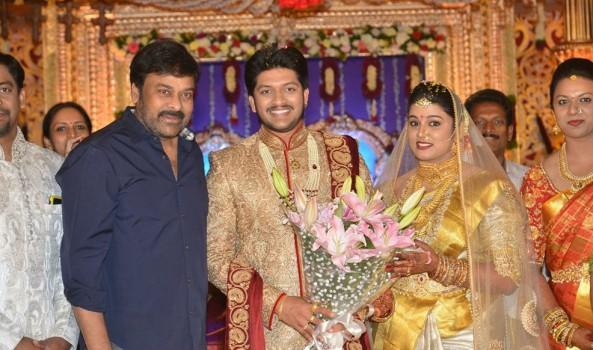 Popular music director Koti's son Rajeev Saluri and Prathyusha wedding reception held at the JRC Convention in Hyderabad. Celebs like Megastar Chiranjeevi, Balakrishna, Venkatesh, Nandamuri Ramakrishna, K Raghavendra Rao, Allu Aravind, MM Keeravani, Murali Mohan, Drums Sivamani, RP Patnaik, Subbarami Reddy and others graced the event.