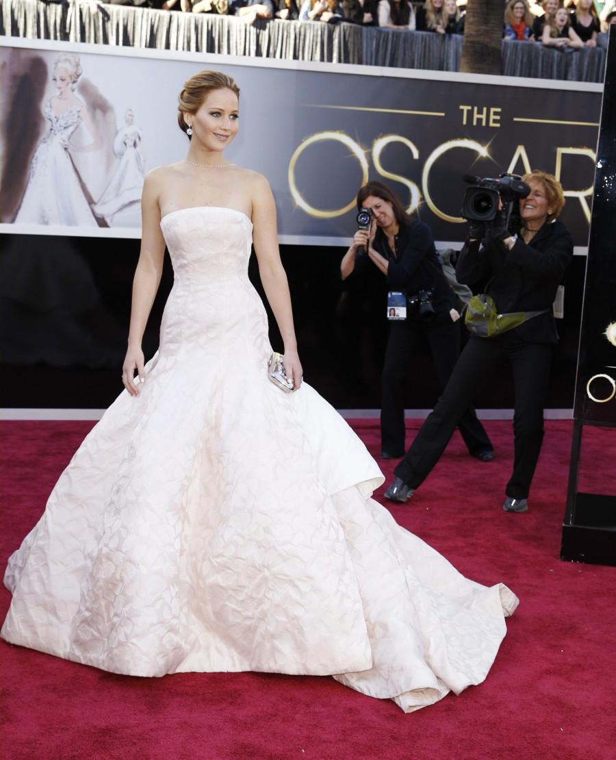Jennifer Lawrence looked gorgeous when she attended the Oscars 2013 wearing Christian Dior full-skirted dress. Oscars 2017,Oscars red carpet,Oscars best dressed celebrities,red carpet look,Jennifer Lawrence,kate Hudson,Anne Hathway,Penelope Cruz,Gwyneth Paltrow,Amanda Seyfried,Jennifer Aniston,Lupita Nyong'o