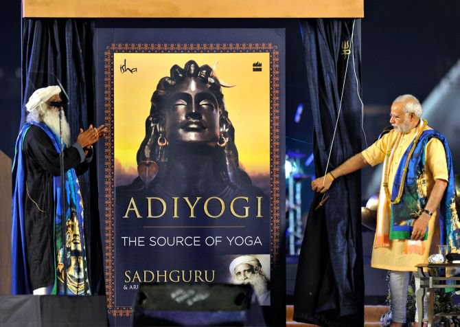 Describing yoga as the "sharpest weapon" in the world to fight stress and bring peace, Prime Minister Narendra Modi on Friday said it is also the passport for health assurance. PM Narendra Modi,Narendra Modi,Modi unveils 112-feet-tall statue,Mahashivratri,Maha shivratri,Mahashivratri 2017,Lord Shiva on Mahashivratri