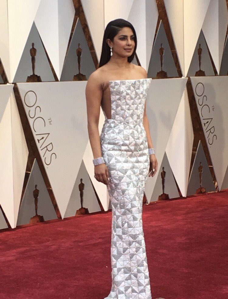 Last year, Priyanka chose a white embellished strapless Zuhair Murad gown for the Oscars. Oscars 2017,Oscars,Priyanka Chopra,Priyanka Chopra at Oscars 2017,Priyanka Chopra at Oscars,Oscars 2017 pics,Oscars 2017 images,Oscars 2017 photos,Oscars 2017 stills,Oscars 2017 pictures