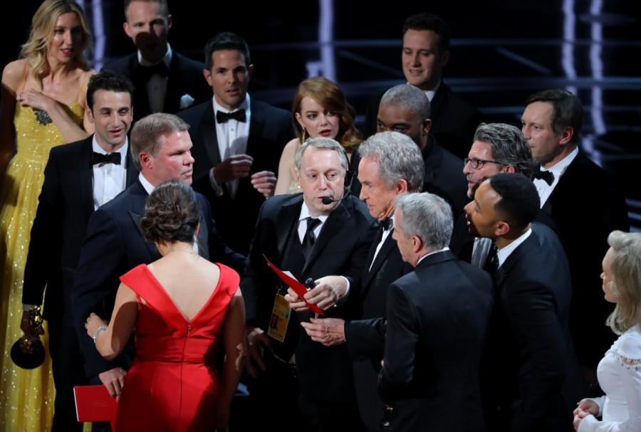 Warren Beatty holds the card for the Best Picture Oscar awarded to Moonlight. La La Land,Moonlight,2017 Oscars,Best Picture,Best Picture of Oscars