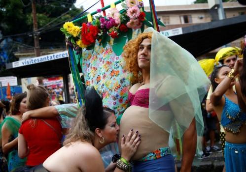 Revelers take part in an annual block party known as 