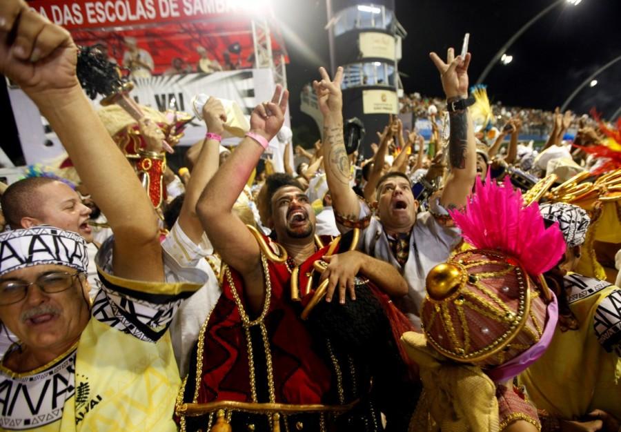 Revelers of the Vai Vai samba school react after they parade in Sao Paulo. Brazil,Brazil Carnival,Brazil Carnival 2017,samba parade,block parties,Rio De Janeiro,Sao Paulo,Carnival 2017,Carnival pics,Carnival images,Carnival photos,Carnival stills,Carnival pictures