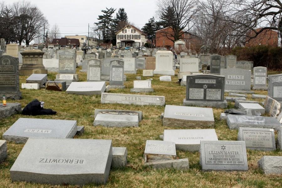 View of headstones on the ground at Mount Carmel Cemetery in Philadelphia. Jewish cemetery,Jewish cemetery vandalized,Jewish vandalized,Philadelphia,Jewish cemetery in St. Louis,St. Louis
