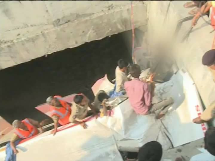 The bus heading to Hyderabad from Bhubaneswar hit a bridge divider and plunged through the gap between the two lanes into the canal near Mollapadu. Vijayawada Accident,Vijayawada bus Accident,bus Accident,bus Accident in Andhra,Krishna district,canal,Vijayawada bus Accident pics,Vijayawada bus Accident images,Vijayawada bus Accident photos,Vijayawada bus Accident stills,Vijayawada bus Accident pictur