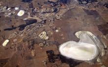 Salt pans and small dams can be seen in drought-affected farming areas located on the outskirts of the Western Australian capital city of Perth.