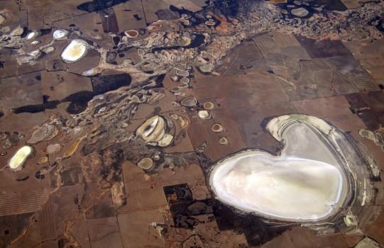 Salt pans and small dams can be seen in drought-affected farming areas located on the outskirts of the Western Australian capital city of Perth.