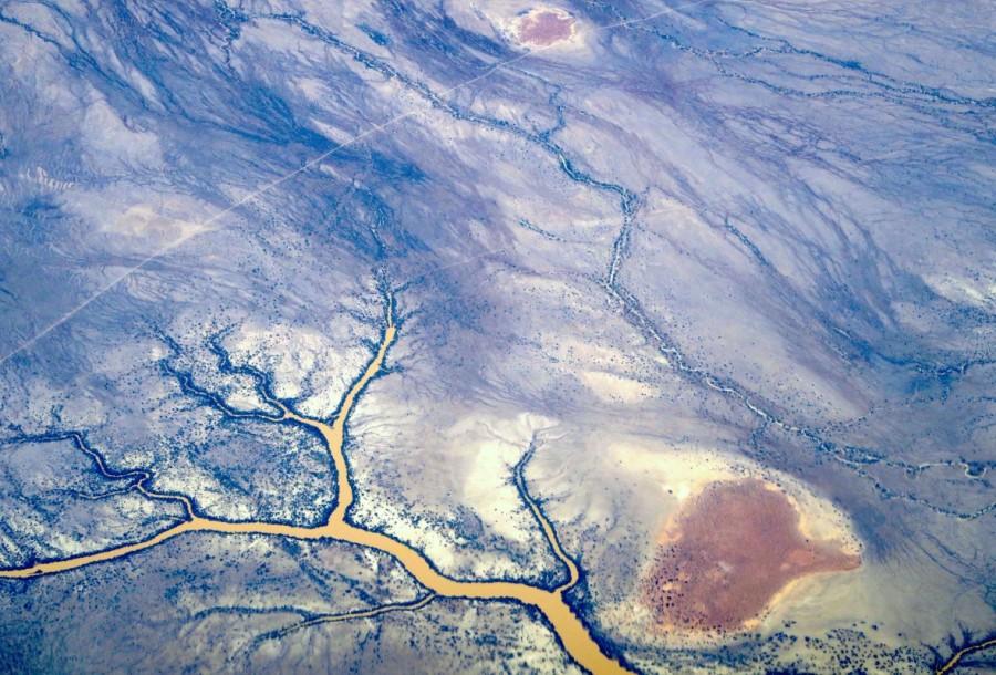River systems can be seen flowing near sand dunes in outback Queensland. Australia from the air,Australia from air,Australia from above,Australia,Awesome Australia,Australia from above pics,Australia from above images,Australia from above photos,Australia from above stills,Australia from above pictures