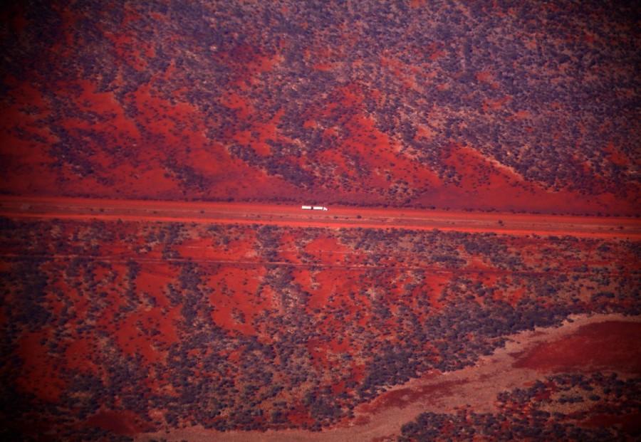 A truck drives along a road in the Pilbara region of Western Australia. Australia from the air,Australia from air,Australia from above,Australia,Awesome Australia,Australia from above pics,Australia from above images,Australia from above photos,Australia from above stills,Australia from above pictures