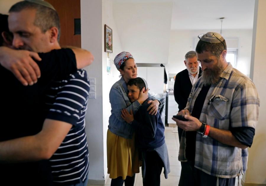 Members of the Israeli Aldar family react inside their home during an operation by Israeli forces to evict residents from several homes in the Israeli settlement of Ofra, in the occupied West Bank February 28, 2017. Israel,Israeli police,Palestinian land,West Bank,Ofra
