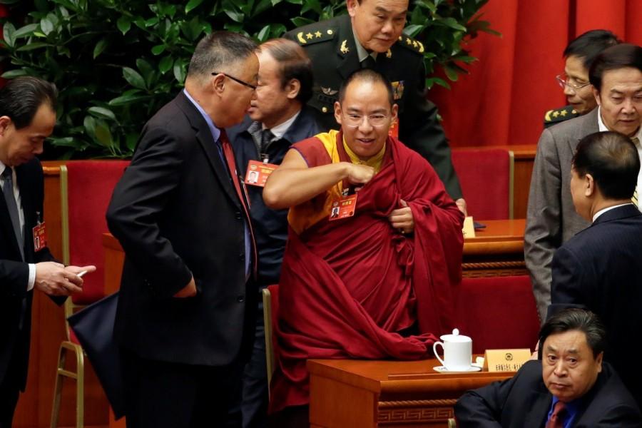 Gyaltsen Norbu, the 11th Panchen Lama and a delegate of Chinese People's Political Consultative Conference (CPPCC), attends the opening ceremony of CPPCC with other delegates at the Great Hall of the People in Beijing, March 3, China, 2017. Congress meets,China Congress meets,Chinese People,Consultative Conference,Beijing