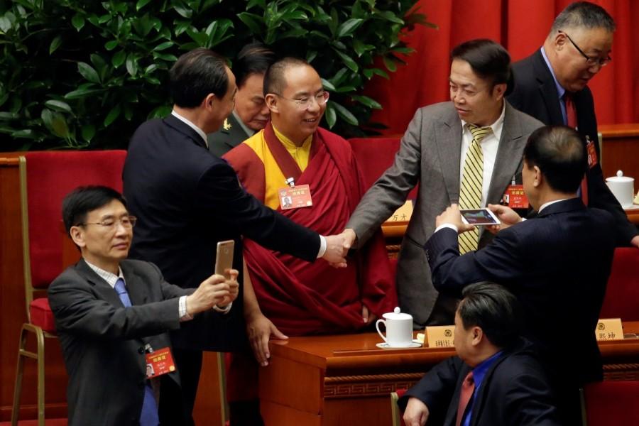 Gyaltsen Norbu, the 11th Panchen Lama and a delegate of Chinese People's Political Consultative Conference (CPPCC), attends the opening ceremony of CPPCC with other delegates at the Great Hall of the People in Beijing, March 3, China, 2017. Congress meets,China Congress meets,Chinese People,Consultative Conference,Beijing