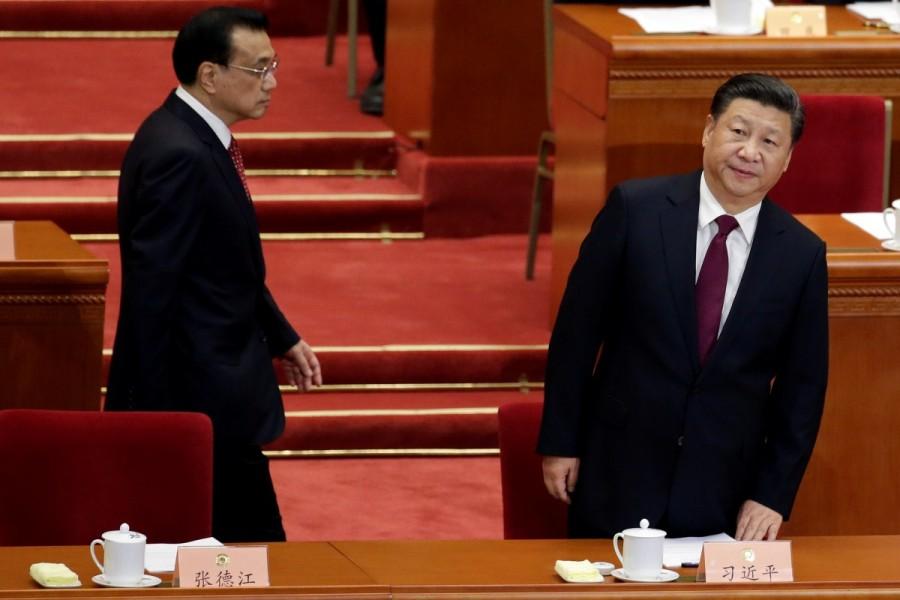 China's President Xi Jinping (R) and Premier Li Keqiang arrive for the opening session of the Chinese People's Political Consultative Conference (CPPCC) at the Great Hall of the People in Beijing, China, March 3, 2017. Congress meets,China Congress meets,Chinese People,Consultative Conference,Beijing
