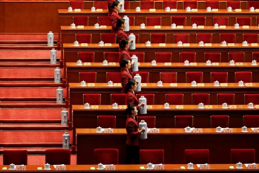 Attendants prepare tea before the opening session of the Chinese People's Political Consultative Conference (CPPCC) at the Great Hall of the People in Beijing, China, March 3, 2017. Congress meets,China Congress meets,Chinese People,Consultative Conference,Beijing