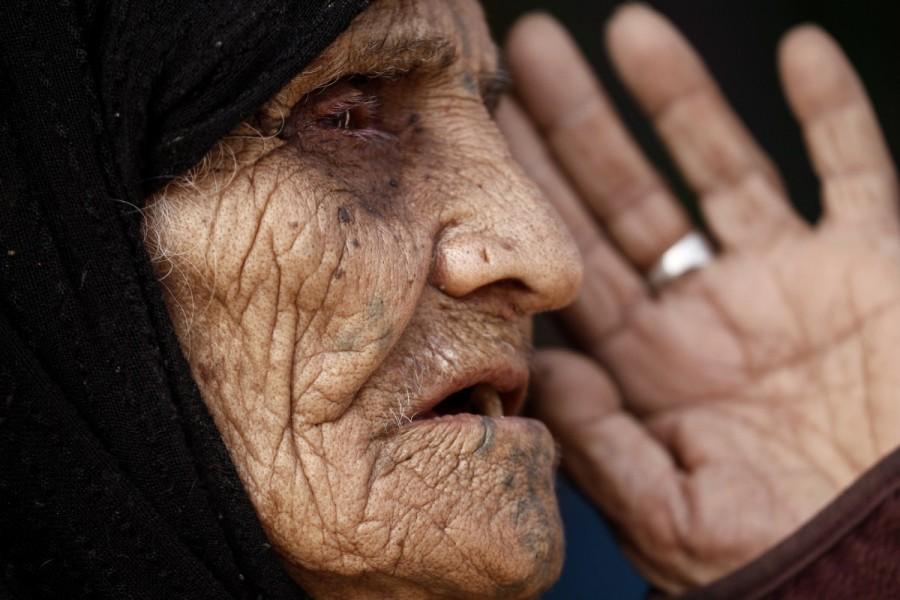 Khatla Ali Abdullah, 90, who recently fled her house in Al Mamoun district speaks with a Reuters journalist as she sits at her tent in Hammam al Alil camp, while Iraqi forces battle with Islamic State militants, in western Mosul, Iraq. Ninety-year-old Khatla Ali Abdallah,Khatla Ali Abdallah,Mosul,Islamic State