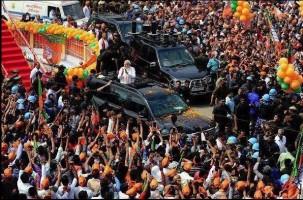 Narendra Modi,Narendra Modi road show,Narendra Modi road show at Varanasi,Narendra Modi  at Varanasi,Narendra Modi arrives for road show