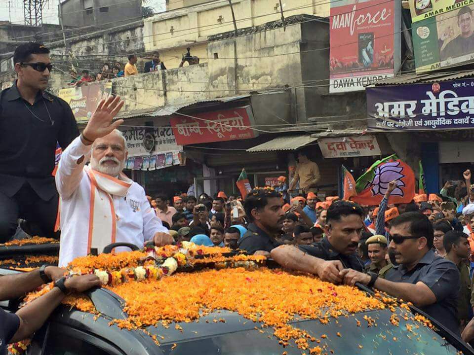 A minor scuffle between Samajwadi Party (SP) and BJP workers took place outside the Singh Dwar of the BHU from where the Prime Minister will start his road show. Narendra Modi,Narendra Modi road show,Narendra Modi road show at Varanasi,Narendra Modi at Varanasi,Narendra Modi arrives for road show