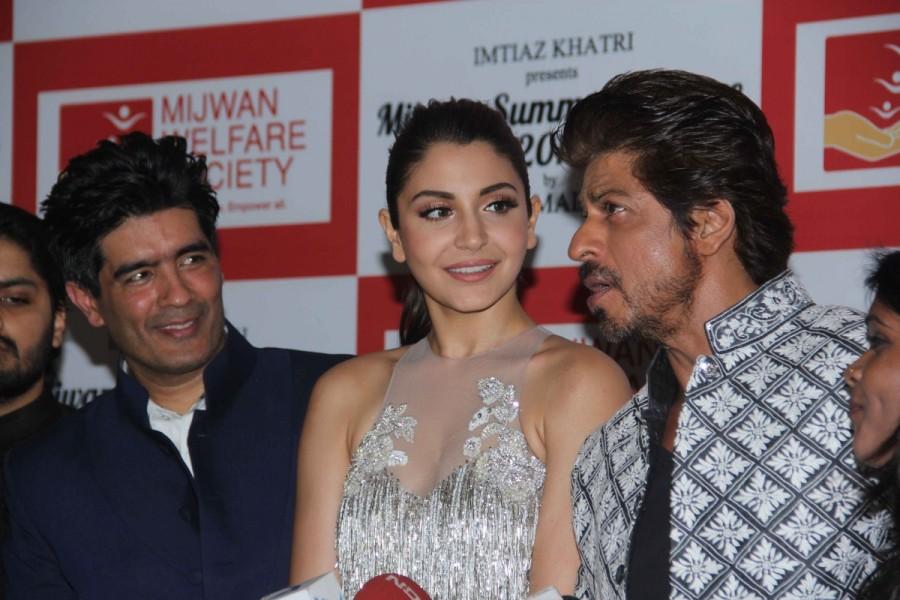 Fashion designer Manish Malhotra, Bollywood actors Shahrukh Khan and Anushka Sharma spotted during the Mijwan Summer 2017 fashion show in Mumbai on March 5, 2017. Manish Malhotra,Shah Rukh Khan,Anushka Sharma,Mijwan Summer 2017 fashion show,Mijwan Summer 2017,Mijwan Summer fashion show,Fashion designer Manish Malhotra,Shah Rukh Khan & Anushka Sharma,Shah Rukh Khan and Anushka Sharma