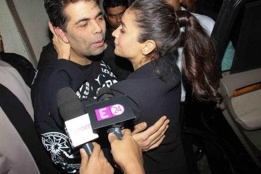 Karan Johar and Alia Bhatt kissed each other in public during Badrinath Ki Dulhania special screening.